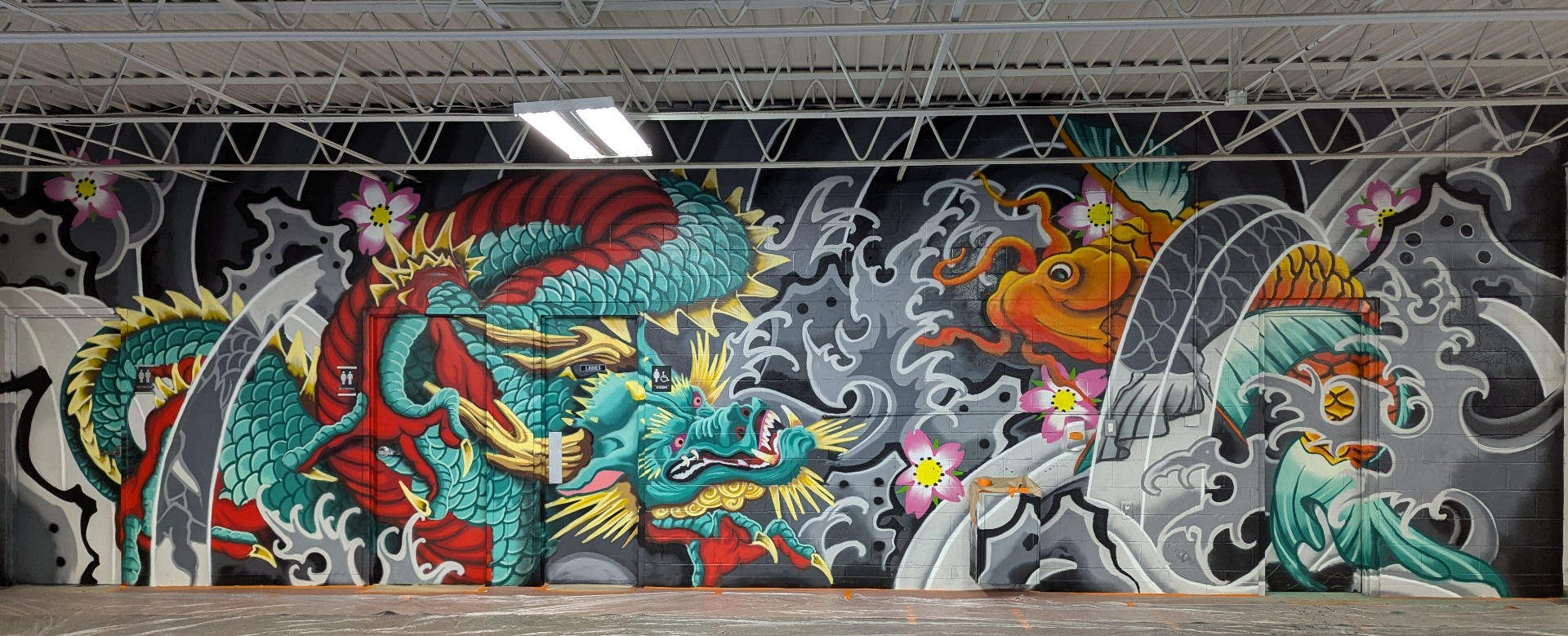 Dragon & Koi — interior mural by The 4th Wall Studio in Des Moines, 2023