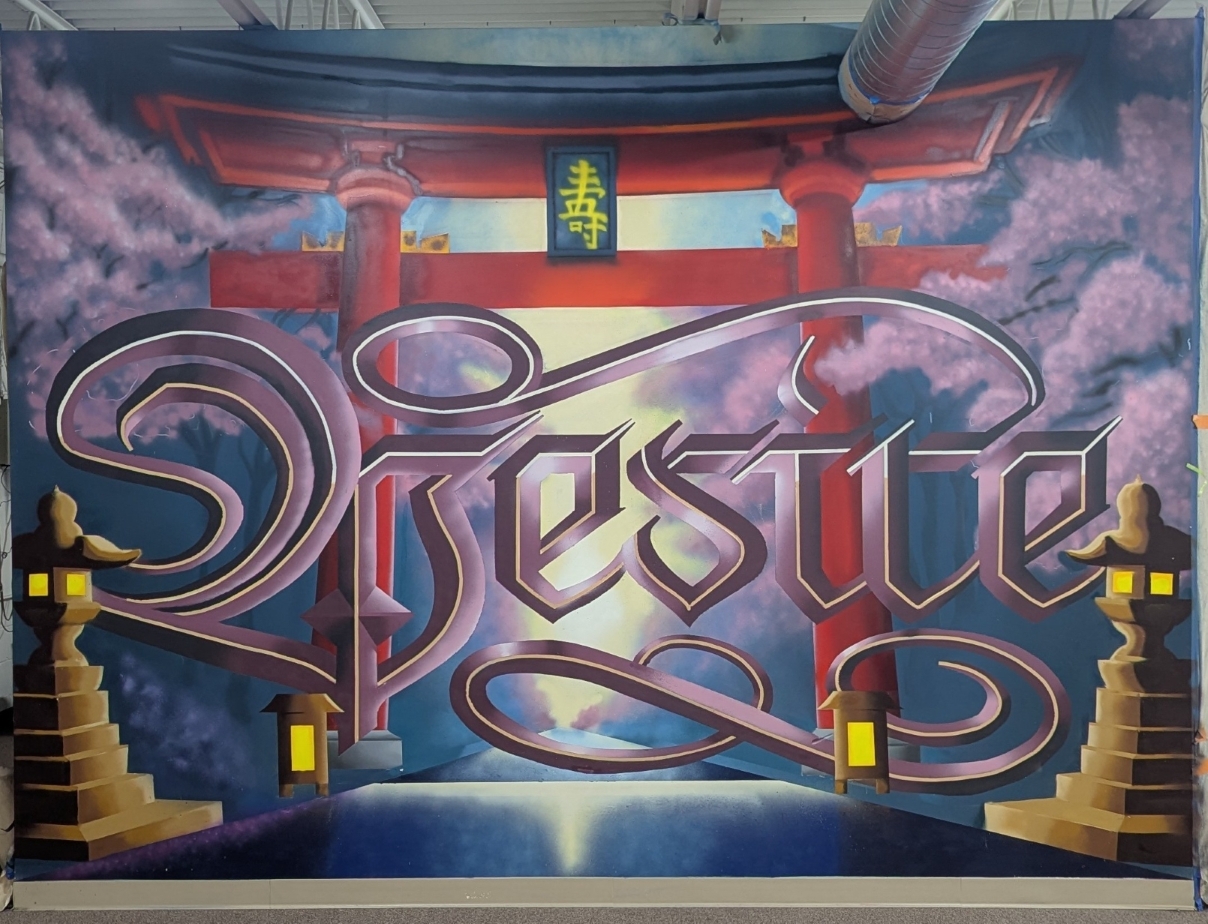 Ornate lettering mural with torii gate and cherry blossoms by The 4th Wall Studio